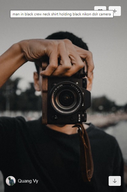 Photo sur Unsplash de Quang Vy homme avec appareil photo
